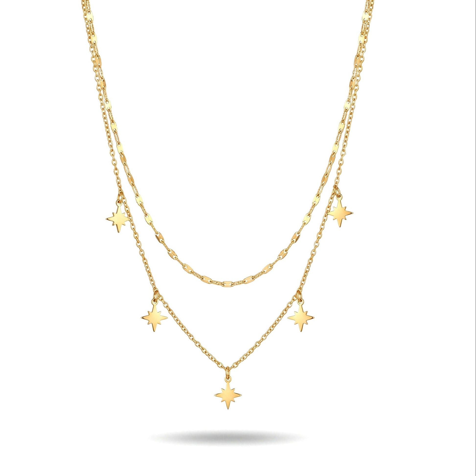 Gold necklace with star pendants on a white background